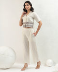 Embrodered cropped off white cordset